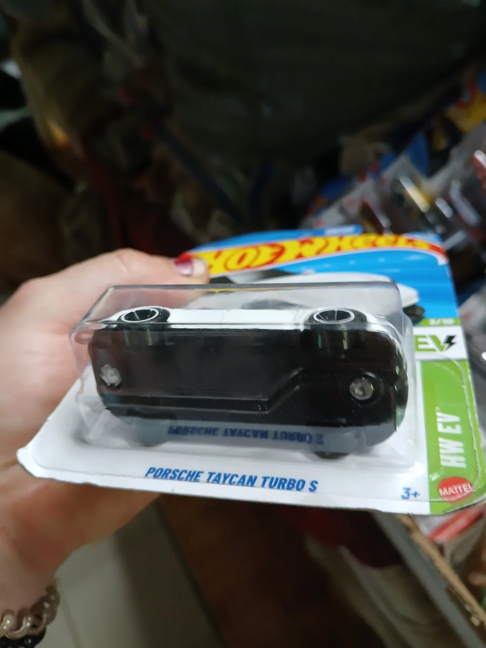 white Hot Wheels Porsche Taycan Turbo S from the 2026 HW EV series (3/10, number